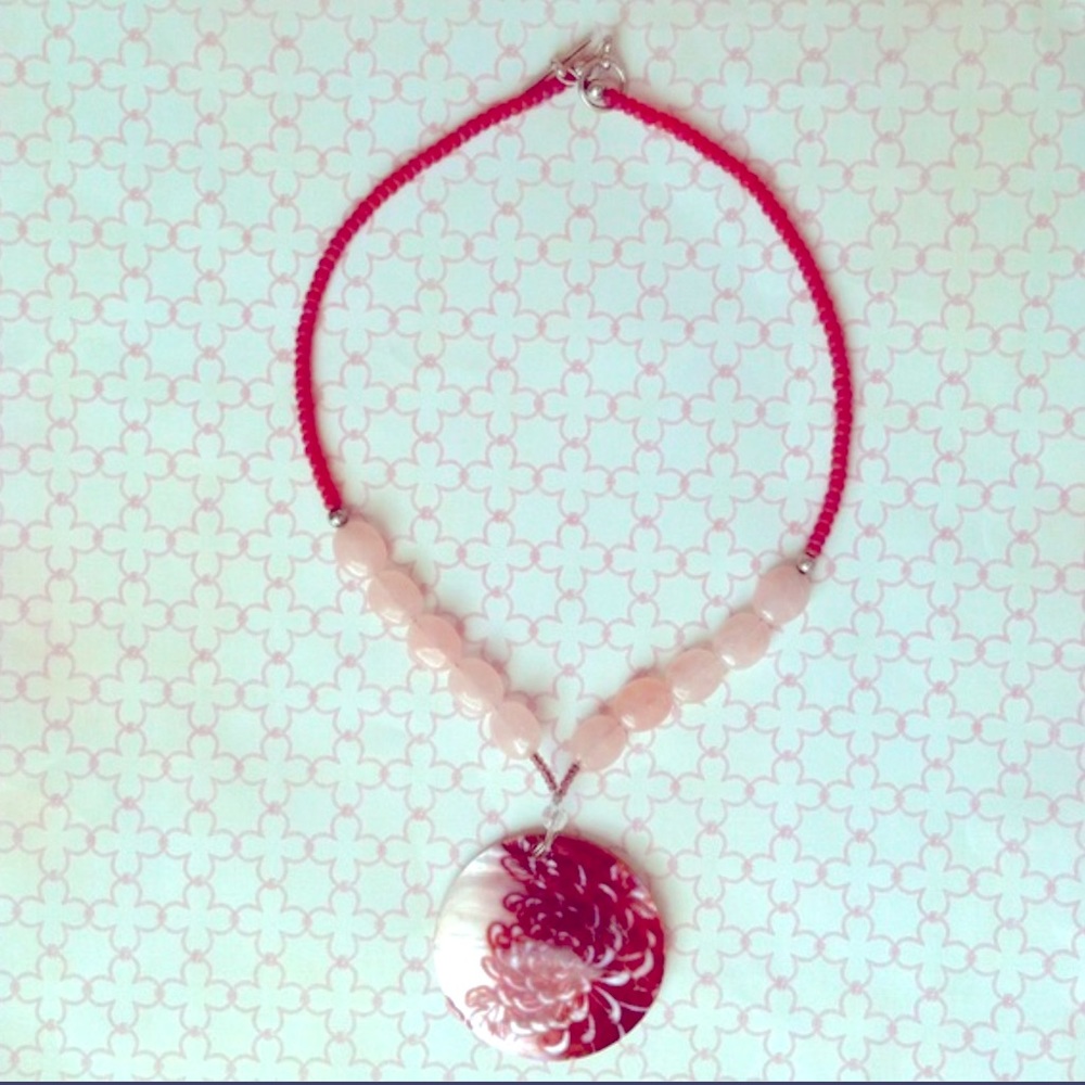 Lotus design,(shell) on beaded necklace;handmade